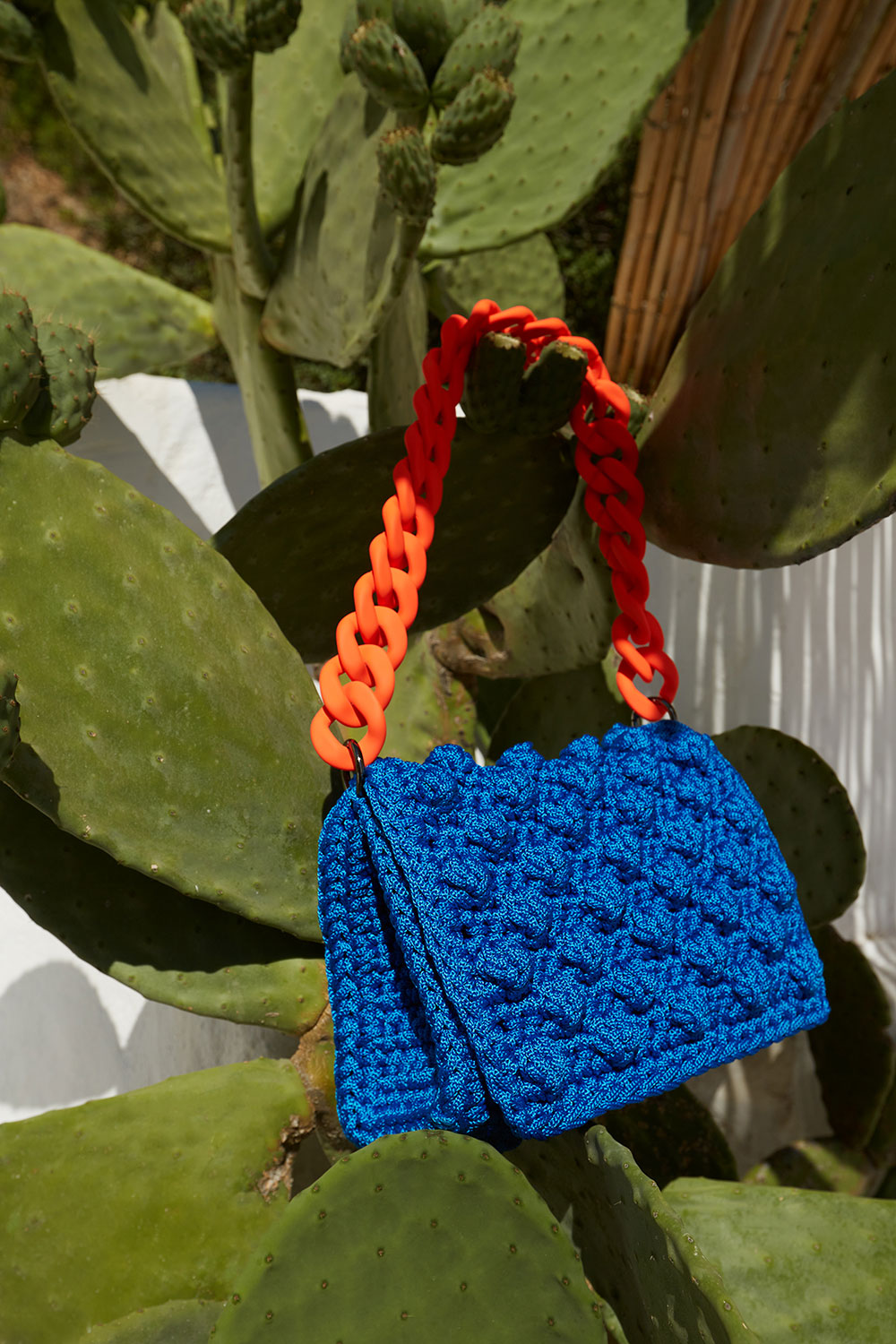 BLUE BUBBLE BAG WITH ORANGE CHAIN